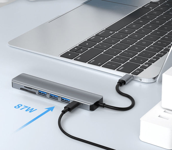 7-in-1 USB-C Hub: Ultimate Connectivity: silver, black USB-C multiport hub/docking adapter, minimal modern style