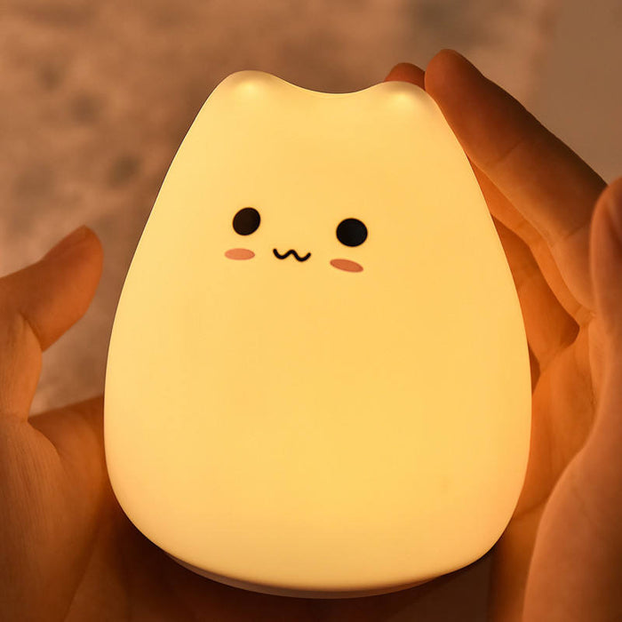 Cute Cat Nursery Lights with Sensor: warm white, pale peach cat, kawaii minimalist cartoon style