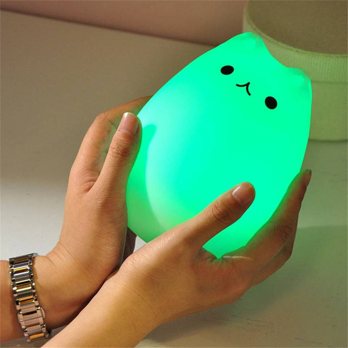 Cute Cat Nursery Lights with Sensor: warm white, pale peach cat, kawaii minimalist cartoon style