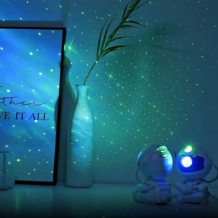LED Galaxy Projector Lights for Kids: white, blue astronaut character, cartoon style