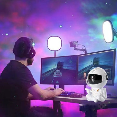 LED Galaxy Projector Lights for Kids: white, blue astronaut character, cartoon style