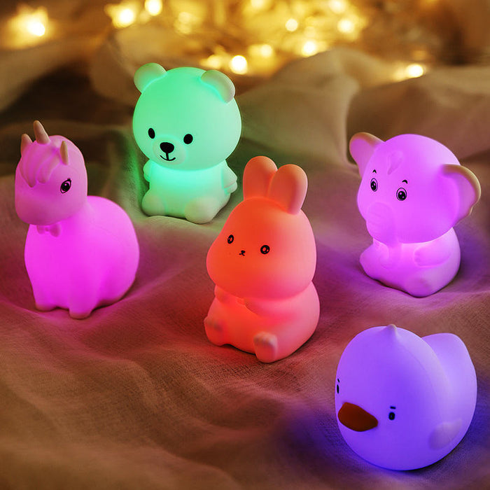 Portable Silicone Night Light with Rechargeable Battery: green, pink bear, unicorn, rabbit, elephant, and bird-like character