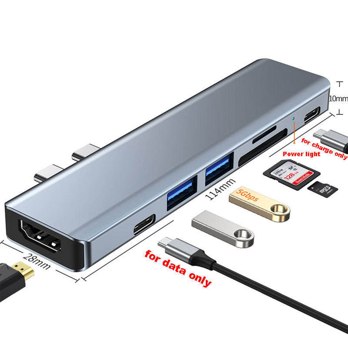 Versatile Docking Station with Multiple Features: silver-gray, black multiport USB hub/docking adapter, minimal tech accessor