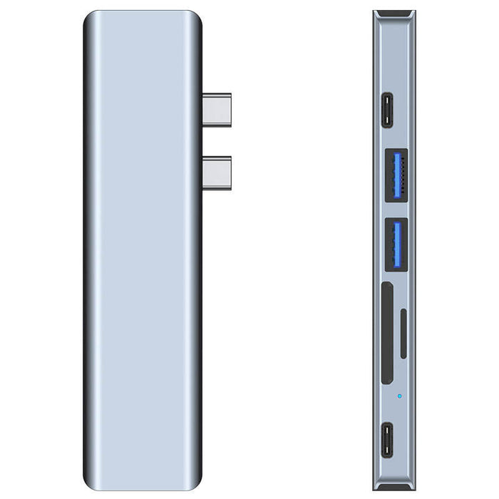 Versatile Docking Station with Multiple Features: silver-gray, black multiport USB hub/docking adapter, minimal tech accessor